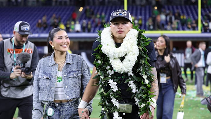 Dec 7, 2024; Indianapolis, IN, USA; Oregon Ducks quarterback Dillon Gabriel (8) walks around the field after defeating the Penn State Nittany Lions to win the Big Ten Championship in the 2024 Big Ten Championship game at Lucas Oil Stadium. Mandatory Credit: Jordan Prather-Imagn Images