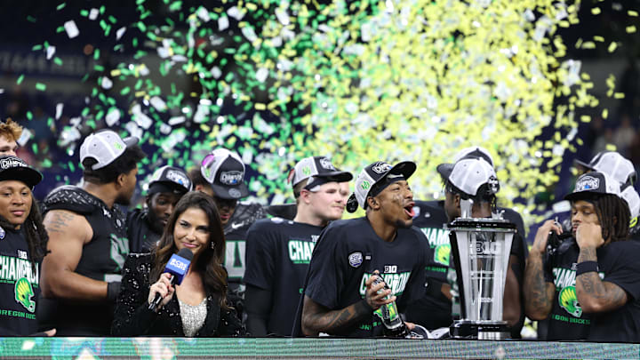 Dec 7, 2024; Indianapolis, IN, USA; The Oregon Ducks celebrate defeating the Penn State Nittany Lions to win the Big Ten Championship in the 2024 Big Ten Championship game at Lucas Oil Stadium. Mandatory Credit: Robert Goddin-Imagn Images