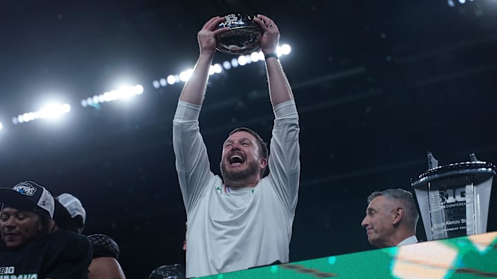 Dec 7, 2024; Indianapolis, IN, USA; Oregon Ducks head coach Dan Lanning celebrates defeating the Penn State Nittany Lions to win the Big Ten Championship in the 2024 Big Ten Championship game at Lucas Oil Stadium. Mandatory Credit: Robert Goddin-Imagn Images