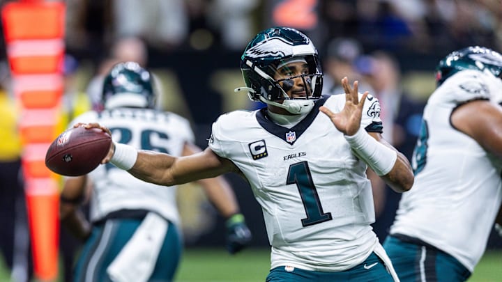 Sep 22, 2024; New Orleans, Louisiana, USA; Philadelphia Eagles quarterback Jalen Hurts (1) passes against the New Orleans Saints during the first half at Caesars Superdome. Mandatory Credit: Stephen Lew-Imagn Images