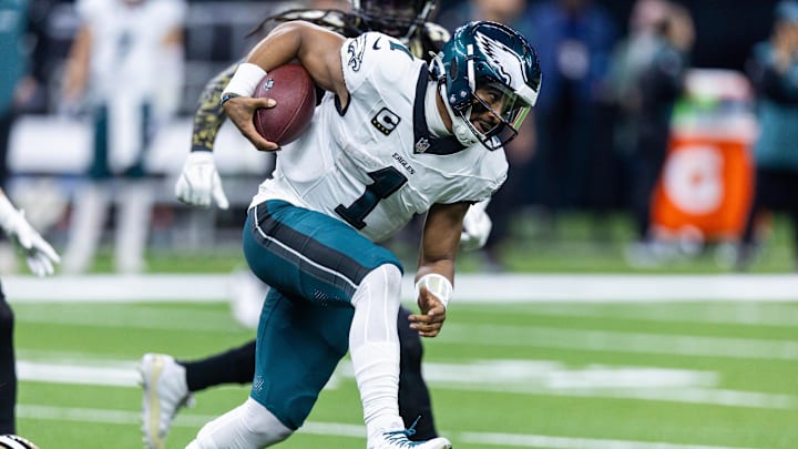 Sep 22, 2024; New Orleans, Louisiana, USA; Philadelphia Eagles quarterback Jalen Hurts (1) scrambles out the pocket against the New Orleans Saints during the first half at Caesars Superdome. Mandatory Credit: Stephen Lew-Imagn Images Sep 22, 2024; New Orleans, Louisiana, USA; Philadelphia Eagles quarterback Jalen Hurts (1) scrambles out the pocket against the New Orleans Saints during the first half at Caesars Superdome. Mandatory Credit: Stephen Lew-Imagn Images