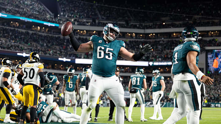 Philadelphia Eagles offensive tackle Lane Johnson (65) spikes the ball after quarterback Jalen Hurts (1) scores against the Pittsburgh Steelers. Philadelphia Eagles offensive tackle Lane Johnson (65) spikes the ball after quarterback Jalen Hurts (1) scores against the Pittsburgh Steelers.