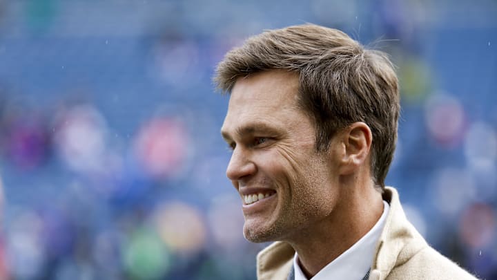 Oct 27, 2024; Seattle, Washington, USA; FOX commentator Tom Brady stands on the sideline before a game between the Seattle Seahawks and Buffalo Bills at Lumen Field. Mandatory Credit: Joe Nicholson-Imagn Images
