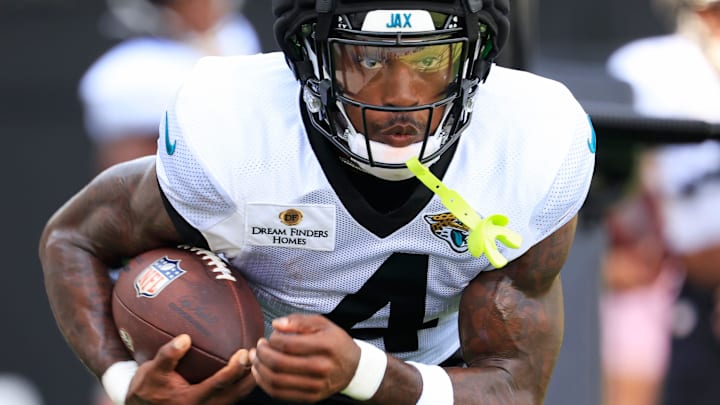 Jacksonville Jaguars running back Tank Bigsby (4) runs the ball during an NFL training camp session at the Miller Electric Center, Thursday, Aug. 14, 2025 in Jacksonville, Fla. Jacksonville Jaguars running back Tank Bigsby (4) runs the ball during an NFL training camp session at the Miller Electric Center, Thursday, Aug. 14, 2025 in Jacksonville, Fla.