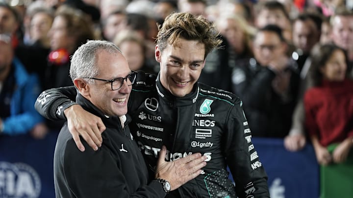 Nov 23, 2024; Las Vegas, Nevada, USA; Mercedes AMG Petronas F1 Team driver George Russell of Great Britain (63) celebrates with his team after winning the Las Vegas Grand Prix at the Las Vegas Circuit. Mandatory Credit: Lucas Peltier-Imagn Images