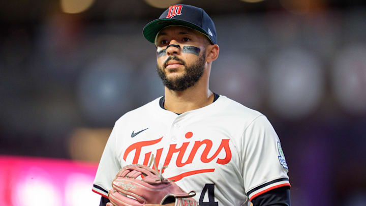 Former Minnesota Twins shortstop Carlos Correa (4) walks to the dugout after the ninth inning against the Washington Nationals at Target Field. 