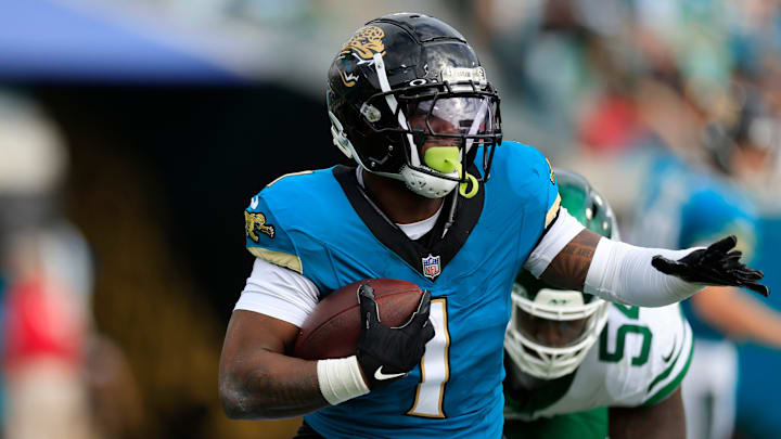 Jacksonville Jaguars running back Travis Etienne Jr. (1) rushes for yards during the second quarter Sunday, Dec. 15, 2024 at EverBank Stadium in Jacksonville, Fla.