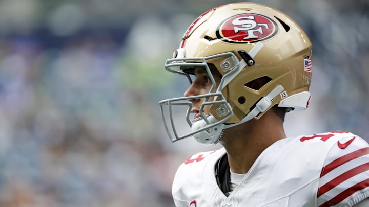San Francisco 49ers quarterback Brock Purdy (13) looks on during warmups before the game against the Seattle Seahawks at Lumen Field. 