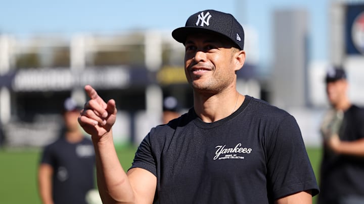 Tampa, FL, USA; New York Yankees outfielder Giancarlo Stanton (27) participates in spring training workouts at George M. Steinbrenner Field.