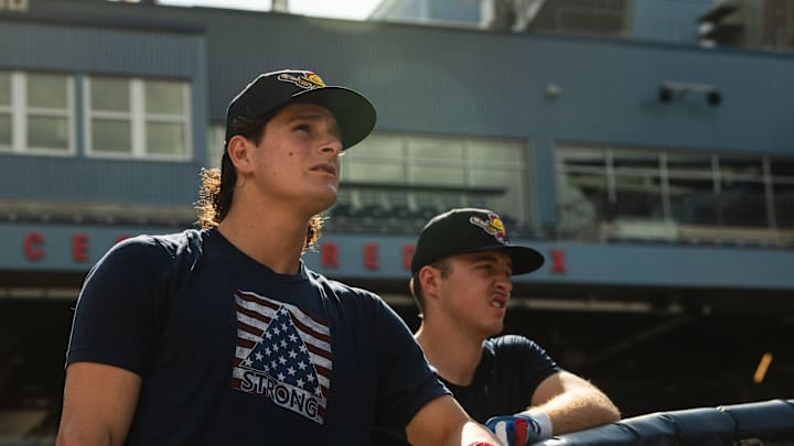 Teammates Roman Anthony (left) and Kyle Teel watch batting practice ahead of the WooSox game on Tuesday at Polar Park.