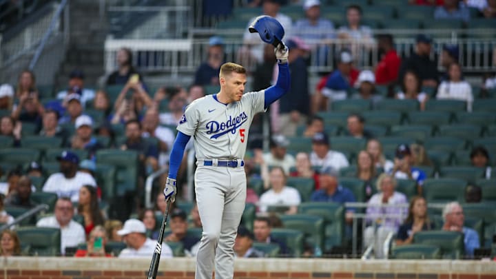 Atlanta, Georgia, USA; Los Angeles Dodgers first baseman Freddie Freeman (5) acknowledges the crowd before an at-bat against the Atlanta Braves in the first inning at Truist Park.