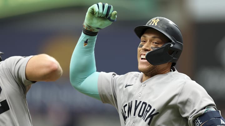 Apr 12, 2026; St. Petersburg, Florida, USA; New York Yankees designated hitter Aaron Judge (99) reacts after hitting a two run home run against the Tampa Bay Rays in the ninth inning at Tropicana Field. Mandatory Credit: Nathan Ray Seebeck-Imagn Images