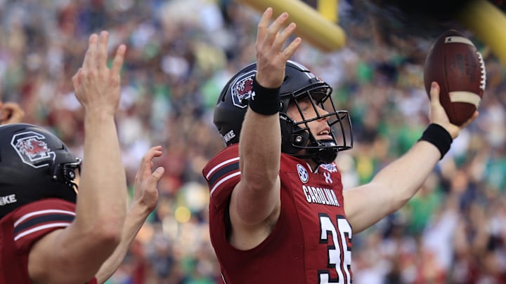 South Carolina Gamecocks long snapper Hunter Rogers (36) reacts to scoring a touchdown during the first quarter of the TaxSlayer Gator Bowl of an NCAA college football game Friday, Dec. 30, 2022 at TIAA Bank Field in Jacksonville. [Corey Perrine/Florida Times-Union]

Jki 123022 Ncaaf Nd Usc Cp 16
