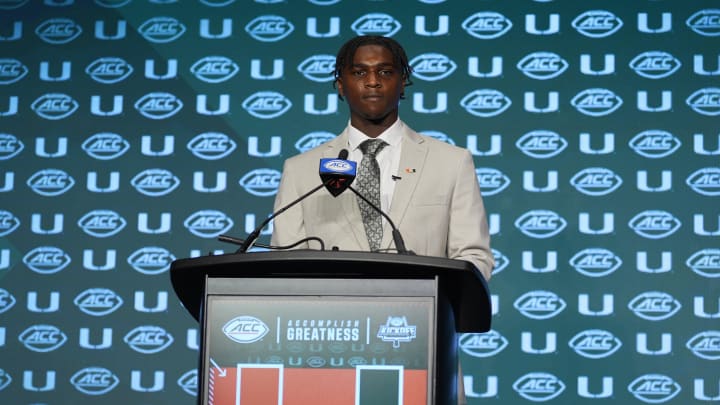 Jul 24, 2024; Charlotte, NC, USA; Miami Hurricanes quarterback Cam Ward speaks to the media during the ACC Kickoff at Hilton Charlotte Uptown. Jul 24, 2024; Charlotte, NC, USA; Miami Hurricanes quarterback Cam Ward speaks to the media during the ACC Kickoff at Hilton Charlotte Uptown.