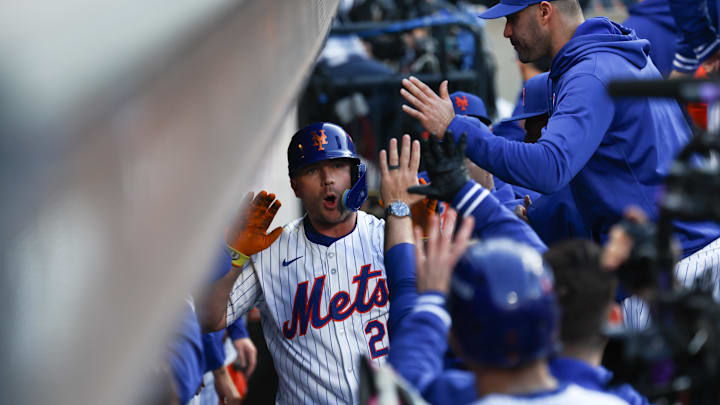 Oct 18, 2024; New York City, New York, USA; New York Mets first baseman Pete Alonso (20) celebrates a three-run home run during the first inning against the Los Angeles Dodgers during game five of the NLCS for the 2024 MLB playoffs at Citi Field. Mandatory Credit: Vincent Carchietta-Imagn Images Oct 18, 2024; New York City, New York, USA; New York Mets first baseman Pete Alonso (20) celebrates a three-run home run during the first inning against the Los Angeles Dodgers during game five of the NLCS for the 2024 MLB playoffs at Citi Field. Mandatory Credit: Vincent Carchietta-Imagn Images