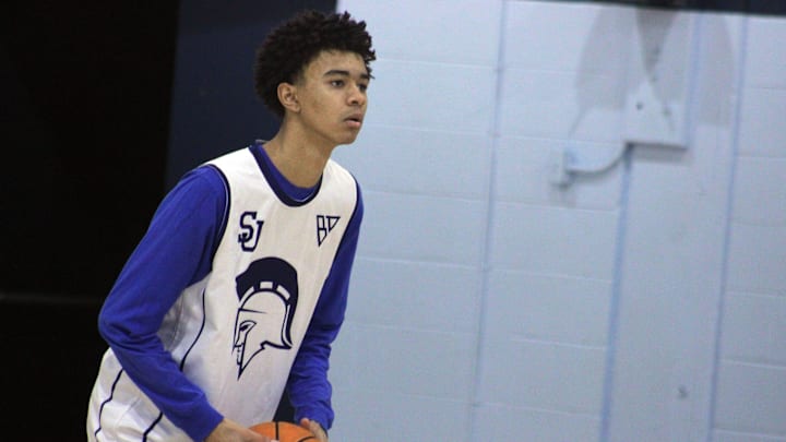St. Johns Country Day forward Camden Cooper prepares to pass the ball during high school boys basketball practice on January 18, 2024. [Clayton Freeman/Florida Times-Union]