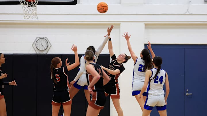 Tocoi Creek's Mckenzie Mabry (3) vie for a rebound during the fourth quarter of the District 3-6A girls basketball final Friday, Feb. 7, 2025 at Bartram Trail High School in St. Johns, Fla. The Tocoi Creek Toros defeated the Bartram Trail Bears 52-37.