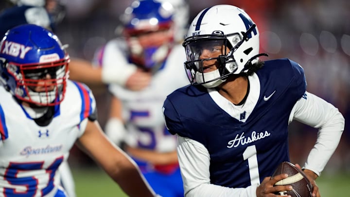 Edmond North throws a pass scrambles during the the high school football game between Edmond North and Bixby at Edmond North in Edmond, Okla., Thursday, Oct. 9, 2025.