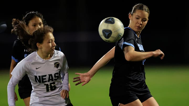 Nease   s Charlotte Rennie (16) and Ponte Vedra's Alia Soares (11) vie for the ball during the second half of a FHSAA District 3-6A high school girls soccer championship matchup Wednesday, Jan. 31, 2024 at Fletcher High School Athletic Complex in Jacksonville Beach, Fla. Ponte Vedra defeated Nease 3-0. [Corey Perrine/Florida Times-Union]