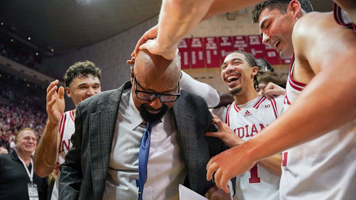 Indiana coach Mike Woodson celebrates with his players after beating Purdue at Simon Skjodt Assembly Hall. 
