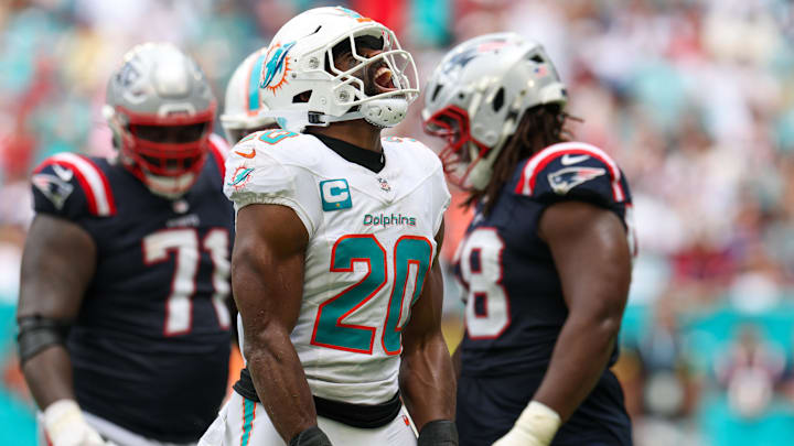 Sep 14, 2025; Miami Gardens, Florida, USA; Miami Dolphins linebacker Jordyn Brooks (20) reacts after play against the New England Patriots in the fourth quarter at Hard Rock Stadium. Mandatory Credit: Nathan Ray Seebeck-Imagn Images