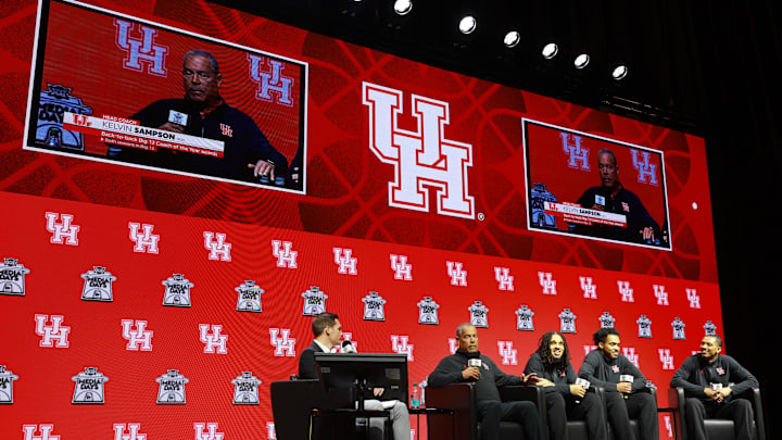 Oct 22, 2025; Kansas City, MO, USA; Houston head coach Kelvin Sampson and players speak to media during Big 12 Menís Basketball media day at T-Mobile Center. Mandatory Credit: Sophia Scheller-Imagn Images