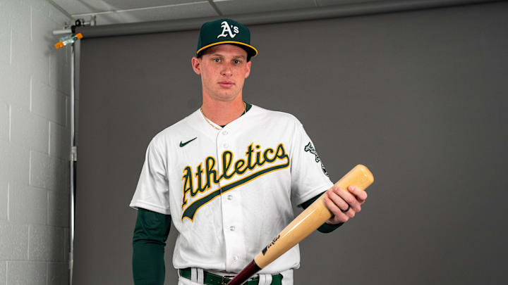 Feb 23, 2023; Mesa, AZ, USA; Oakland Athletics infielder Logan Davidson (49) poses for a portrait during spring training photo day at HoHoKam Stadium. Mandatory Credit: Allan Henry-Imagn Images Feb 23, 2023; Mesa, AZ, USA; Oakland Athletics infielder Logan Davidson (49) poses for a portrait during spring training photo day at HoHoKam Stadium. Mandatory Credit: Allan Henry-Imagn Images