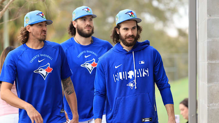 Toronto Blue Jays pitchers Kevin Gausman, Dylan Cease, and Cody Ponce work out.