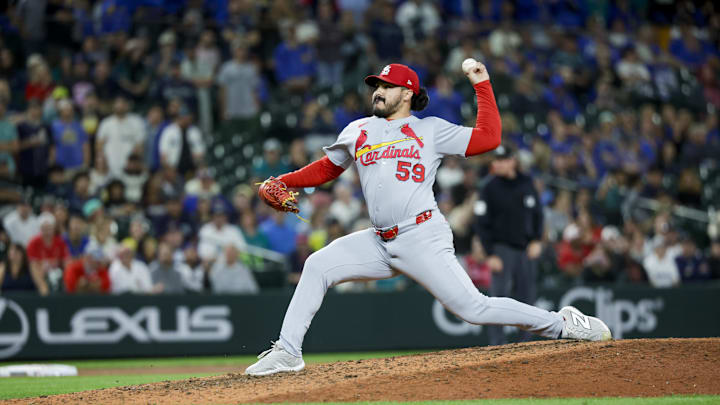 Sep 10, 2025; Seattle, Washington, USA; St. Louis Cardinals pitcher JoJo Romero (59) throws against the Seattle Mariners during the ninth inning at T-Mobile Park. Mandatory Credit: Joe Nicholson-Imagn Images