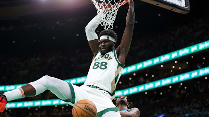 Jan 30, 2024; Boston, Massachusetts, USA; Boston Celtics center Neemias Queta (88) dunks the ball during the second half against the Indiana Pacers at TD Garden. Mandatory Credit: Paul Rutherford-Imagn Images