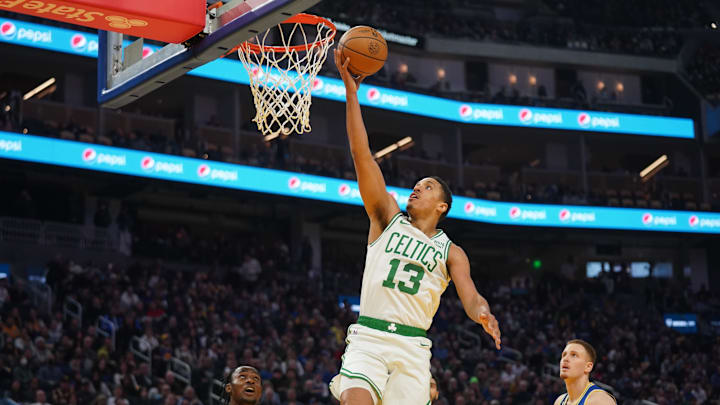 Dec 10, 2022; San Francisco, California, USA; Boston Celtics guard Malcolm Brogdon (13) makes a layup against the Golden State Warriors in the second quarter at the Chase Center. Mandatory Credit: Cary Edmondson-Imagn Images