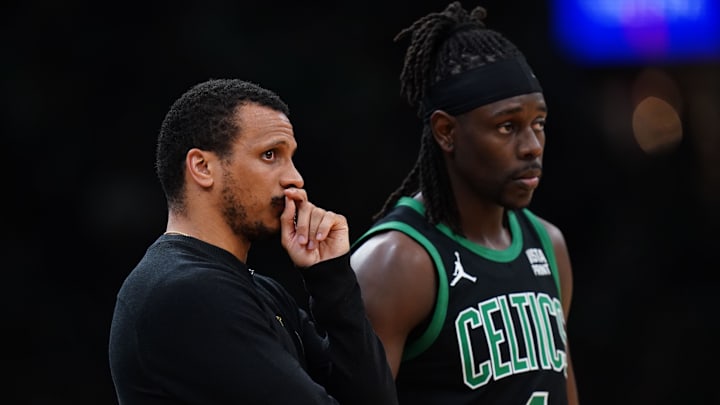 May 23, 2024; Boston, Massachusetts, USA; Boston Celtics head coach Joe Mazzulla talks with guard Jrue Holiday (4) from the sideline as they take on the Indiana Pacers during game two of the eastern conference finals for the 2024 NBA playoffs at TD Garden. Mandatory Credit: David Butler II-Imagn Images