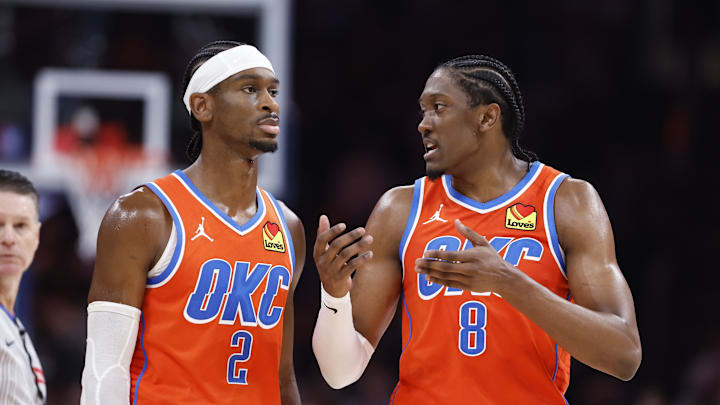 Nov 10, 2024; Oklahoma City, Oklahoma, USA; Oklahoma City Thunder guard Shai Gilgeous-Alexander (2) and forward Jalen Williams (8) talk during a time out against the Golden State Warriors during the second half at Paycom Center. Mandatory Credit: Alonzo Adams-Imagn Images