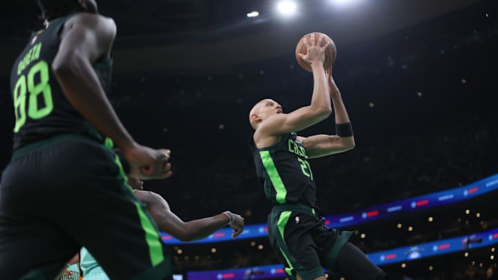 Apr 13, 2025; Boston, Massachusetts, USA; Boston Celtics forward Jordan Walsh (27) shoots during the first half against the Charlotte Hornets at TD Garden. Mandatory Credit: Paul Rutherford-Imagn Images