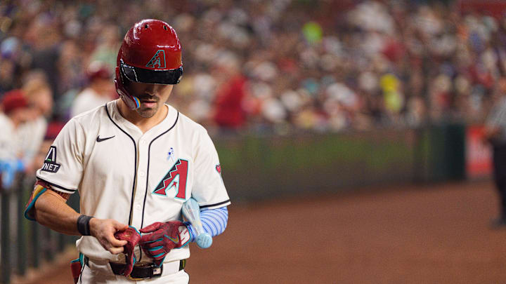 Jun 15, 2025; Phoenix, Arizona, USA; Arizona Diamondbacks outfielder Corbin Carroll (7) takes the field as he leads off in the first inning against the San Diego Padres at Chase Field. Mandatory Credit: Allan Henry-Imagn Images