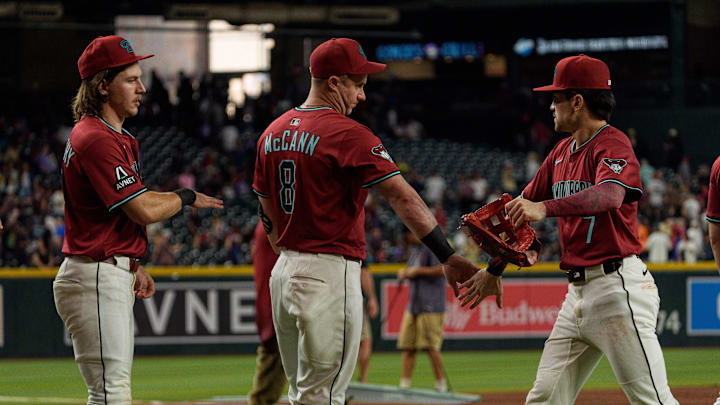 Sep 21, 2025; Phoenix, Arizona, USA; Arizona Diamondbacks outfielder Corbin Carroll (7) celebrates with his team after becoming the first Arizona Diamondbacks to join the 30-30 club during a game against the Philadelphia Phillies at Chase Field. Mandatory Credit: Allan Henry-Imagn Images Sep 21, 2025; Phoenix, Arizona, USA; Arizona Diamondbacks outfielder Corbin Carroll (7) celebrates with his team after becoming the first Arizona Diamondbacks to join the 30-30 club during a game against the Philadelphia Phillies at Chase Field. Mandatory Credit: Allan Henry-Imagn Images