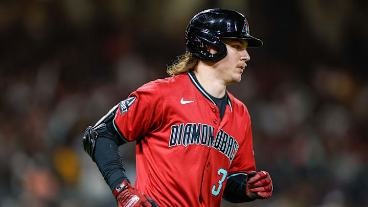 Sep 26, 2025; San Diego, California, USA; Arizona Diamondbacks left fielder Jake McCarthy (31) hits a one run home run during the third inning against the San Diego Padres at Petco Park. Mandatory Credit: David Frerker-Imagn Images