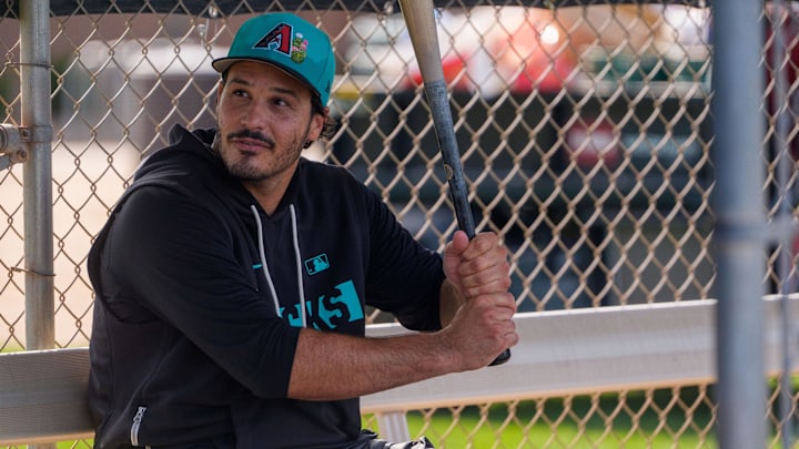 Feb 10, 2026; Scottsdale, AZ, USA; Arizona Diamondbacks infielder Nolan Arenado (28) grabs a bat during workouts at Salt River Fields at Talking Stick. Mandatory Credit: Allan Henry-Imagn Images
