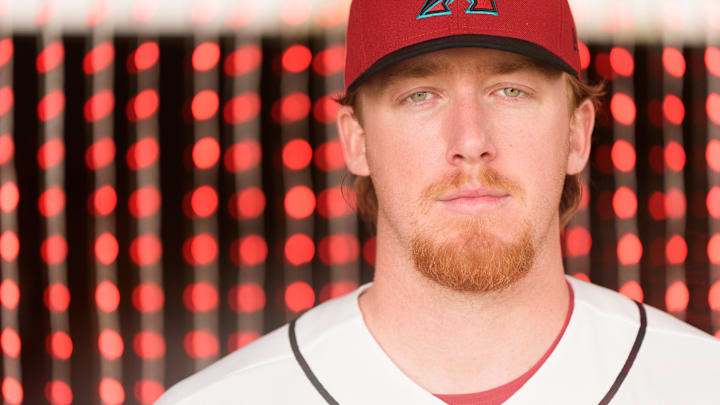 Feb 18, 2026; Scottsdale, AZ, USA; Arizona Diamondbacks pitcher Grant Holman (92) poses for a photo for MLB media day at Salt River Fields at Talking Stick. Mandatory Credit: Allan Henry-Imagn Images