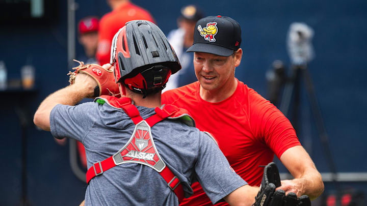 Left-handed pitcher Rich Hill hugs WooSox catcher Kyle Teel after the two shared a bullpen session on Aug. 18, 2024, at Polar Park. Left-handed pitcher Rich Hill hugs WooSox catcher Kyle Teel after the two shared a bullpen session on Aug. 18, 2024, at Polar Park.