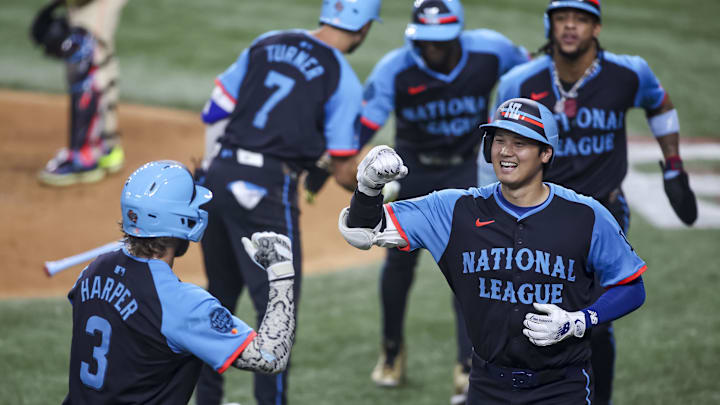 The National League celebrates after National League designated hitter Shohei Ohtani of the Los Angeles Dodgers (17) hit a three run home run during the third inning during the 2024 MLB All-Star game at Globe Life Field on July 16, 2024. The National League celebrates after National League designated hitter Shohei Ohtani of the Los Angeles Dodgers (17) hit a three run home run during the third inning during the 2024 MLB All-Star game at Globe Life Field on July 16, 2024.