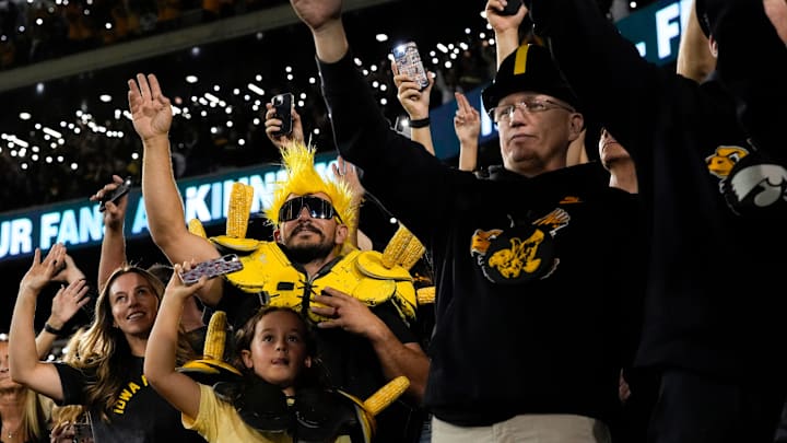 Iowa Hawkeyes fans wave to the patients at the Stead Family Children’s Hospital after the first quarter during a college football game against the Penn State Nittany Lions Oct. 18, 2025 at Kinnick Stadium in Iowa City, Iowa.