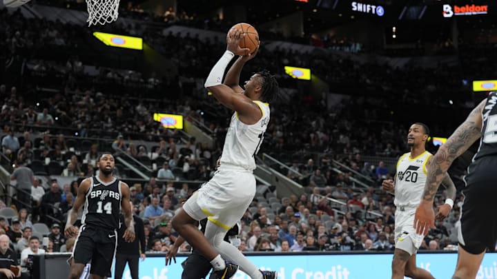 Nov 9, 2024; San Antonio, Texas, USA;  Utah Jazz guard Isaiah Collier (13) shoots in the first half against the San Antonio Spurs at Frost Bank Center. Mandatory Credit: Daniel Dunn-Imagn Images