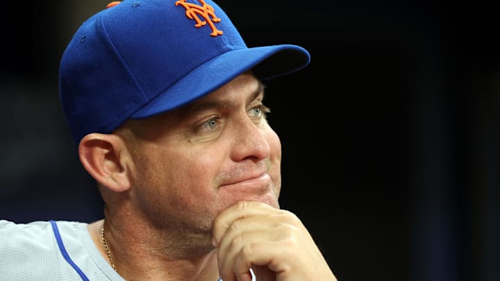 May 4, 2024; St. Petersburg, Florida, USA; New York Mets manager Carlos Mendoza (64) looks on against the Tampa Bay Rays during the third inning at Tropicana Field. Mandatory Credit: Kim Klement Neitzel-Imagn Images May 4, 2024; St. Petersburg, Florida, USA; New York Mets manager Carlos Mendoza (64) looks on against the Tampa Bay Rays during the third inning at Tropicana Field. Mandatory Credit: Kim Klement Neitzel-Imagn Images