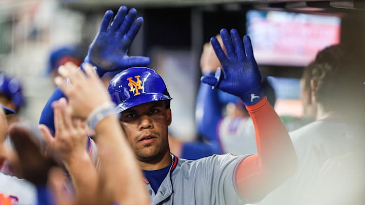 Aug 22, 2025; Cumberland, Georgia, USA; New York Mets outfielder Juan Soto (22) celebrates a home run hit against the Atlanta Braves in the dugout during the seventh inning at Truist Park. Mandatory Credit: Jordan Godfree-Imagn Images Aug 22, 2025; Cumberland, Georgia, USA; New York Mets outfielder Juan Soto (22) celebrates a home run hit against the Atlanta Braves in the dugout during the seventh inning at Truist Park. Mandatory Credit: Jordan Godfree-Imagn Images