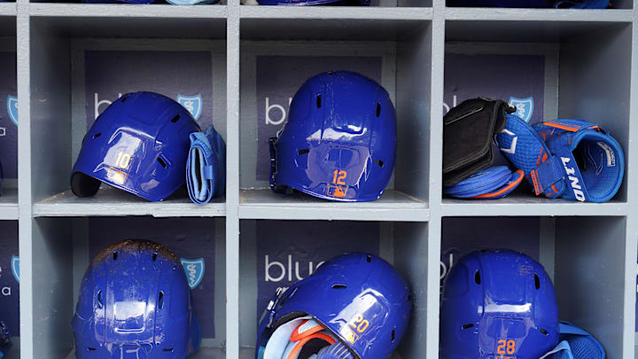 Jun 4, 2022; Los Angeles, California, USA; The batting helmets of New York Mets third baseman Eduardo Escobar (10), shortstop Francisco Lindor (12), left fielder Mark Canha (19), first baseman Pete Alonso (20) and left fielder J.D. Davis (28) in the dugout at Dodger Stadium. Mandatory Credit: Kirby Lee-Imagn Images