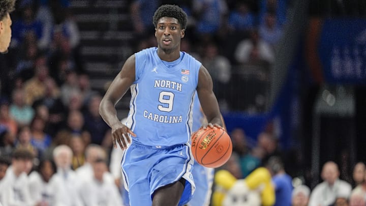 Mar 14, 2025; Charlotte, NC, USA; North Carolina Tar Heels guard Drake Powell (9) during the first half against the Duke Blue Devils at Spectrum Center. Mandatory Credit: Jim Dedmon-Imagn Images