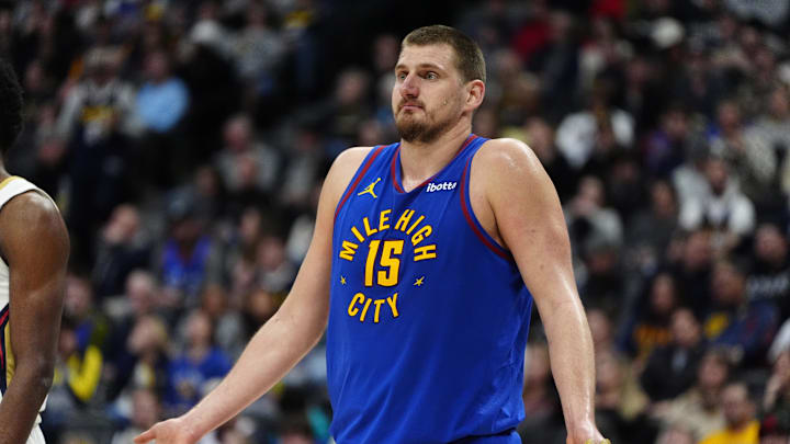 Feb 3, 2025; Denver, Colorado, USA; Denver Nuggets center Nikola Jokic (15) reacts in the second quarter against the New Orleans Pelicans at Ball Arena. Mandatory Credit: Ron Chenoy-Imagn Images