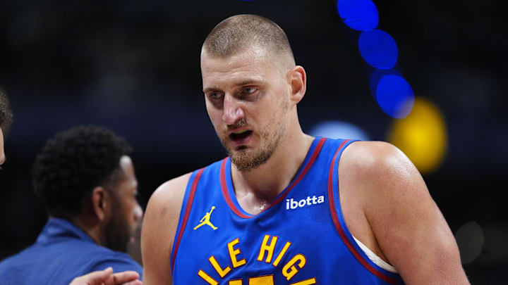 Apr 20, 2026; Denver, Colorado, USA; Denver Nuggets center Nikola Jokic (15) walks to the bench in the second quarter against the Minnesota Timberwolves during game two of the first round of the 2026 NBA Playoffs at Ball Arena.