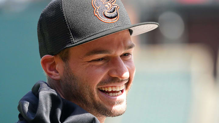 Apr 11, 2022; Baltimore, Maryland, USA; Baltimore Orioles first baseman Trey Mancini (16) during batting practice before the game against the Milwaukee Brewers at Oriole Park at Camden Yards. Mandatory Credit: Mitch Stringer-Imagn Images